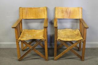 Appraisal: Pair of Stitched Leather Safari Style Chair From an east