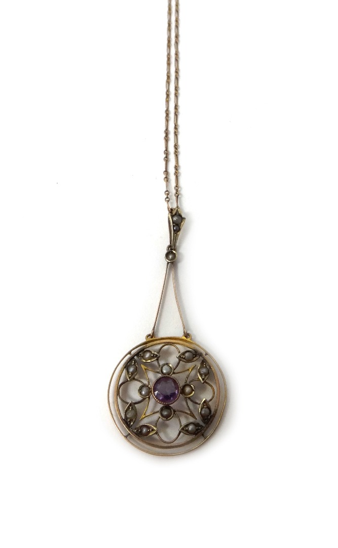 Appraisal: A gold amethyst and seed pearl set pendant pierced in