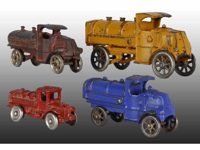 Appraisal: Lot of Cast Iron Gasoline Truck Toys Description Small red