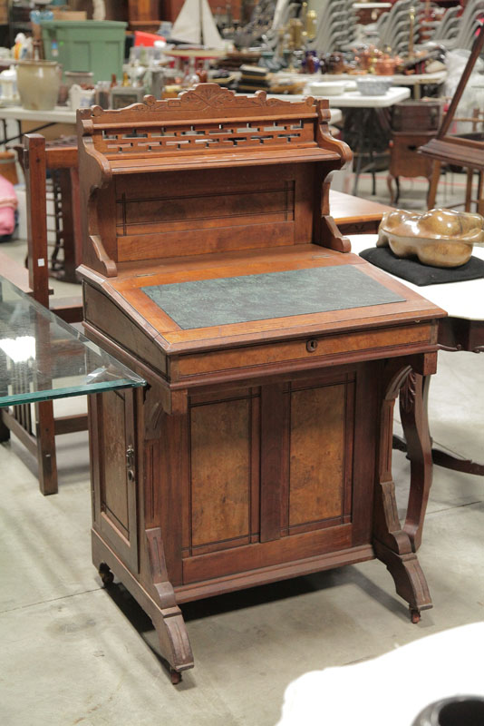 Appraisal: DAVENPORT DESK Walnut having an openwork and incised gallery slate