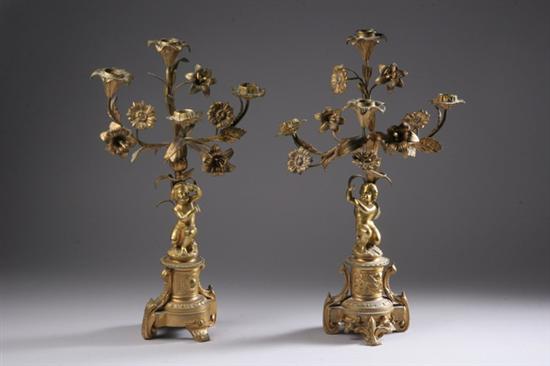 Appraisal: PAIR LOUIS XVI-STYLE DOR BRONZE FOUR-LIGHT CANDELABRA mid- th century