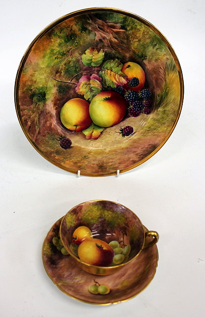 Appraisal: A PORCELAIN PLATE painted by Richard Budd depicting apples and