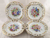 Appraisal: A set of six hand painted floral th c teaplates