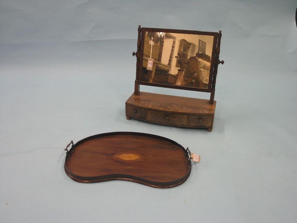 Appraisal: A Victorian mahogany toilet mirror bow-fronted with three drawers ft