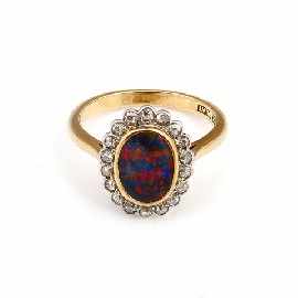 Appraisal: An ct gold and platinum black opal and diamond cluster