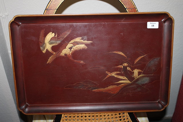 Appraisal: A JAPANESE RED LACQUER RECTANGULAR TRAY decorated in gilt with