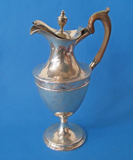 Appraisal: A GEORGE III IRISH EWER of vase form the hinged