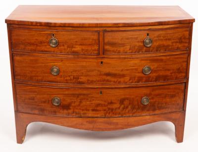 Appraisal: A early th Century mahogany bowfront chest fitted two short