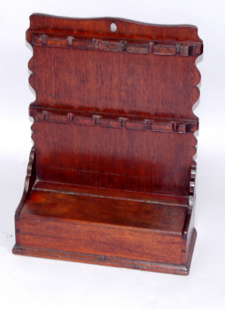 Appraisal: A Georgian oak spoon rack and candle box wall mounted