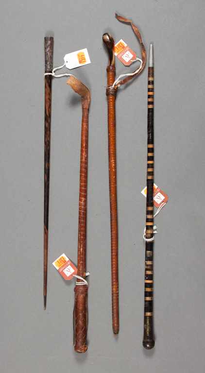 Appraisal: Four swagger sticks th and th century one of ebony