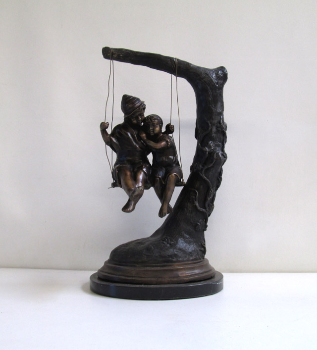 Appraisal: FIGURAL GROUP CAST BRONZE SCULPTURE depicting two children in a