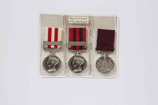 Appraisal: THREE MEDALS awarded to Private J Pollard of the rd