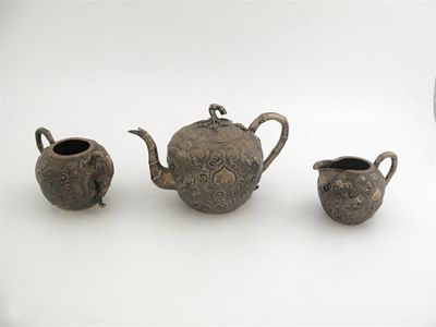 Appraisal: A late th century Chinese embossed globular piece teaset decorated