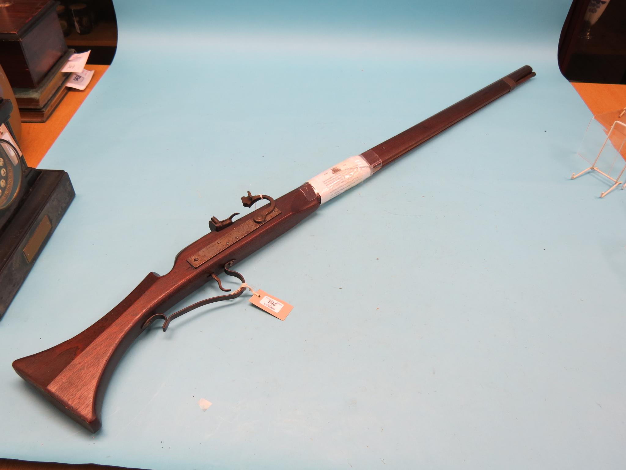 Appraisal: A muzzle-loading shotgun calibre hardwood stock with in barrel with