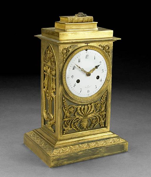 Appraisal: An Empire style gilt bronze mantel clock th century Of