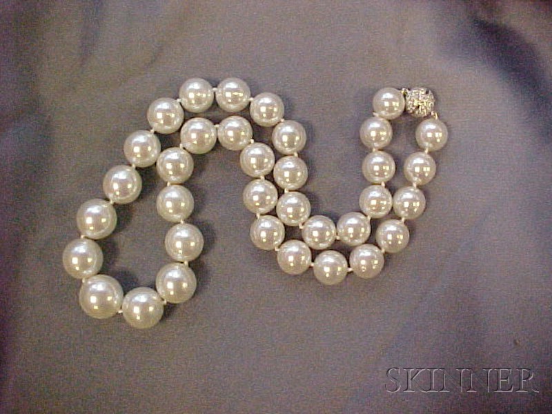 Appraisal: South Sea Pearl and Diamond Necklace composed of thirty-five pearls