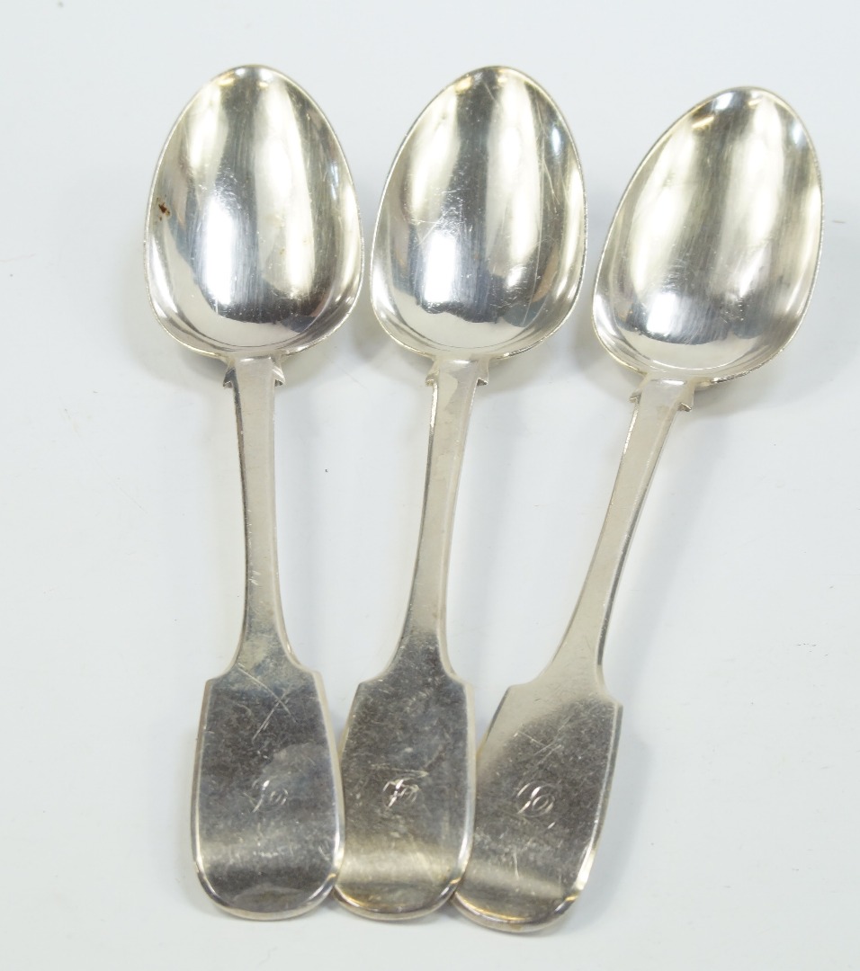 Appraisal: A set of three Victorian silver table spoons decorated in