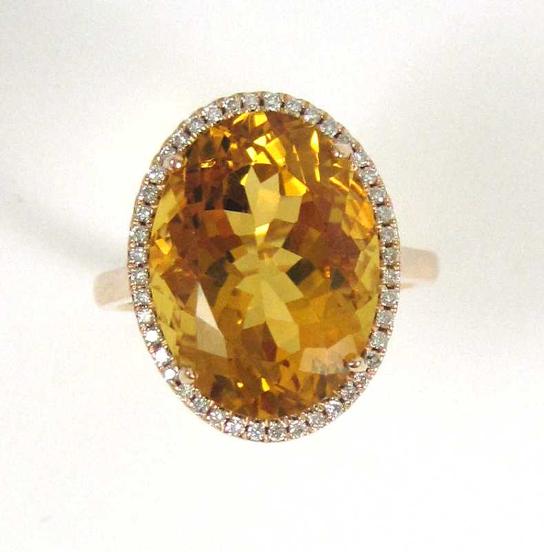 Appraisal: CITRINE DIAMOND AND FOURTEEN KARAT GOLD RING The rose gold