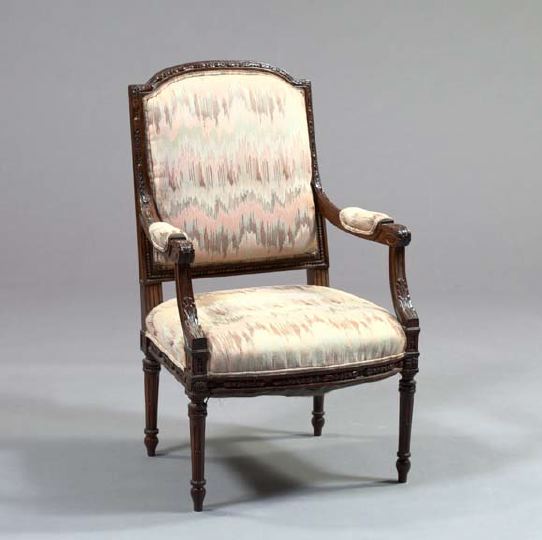 Appraisal: Louis XVI-Style Fruitwood Fauteuil the domed and padded back joined