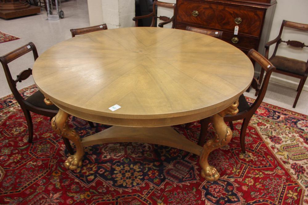 Appraisal: ITALIAN EXPORT CENTER TABLE the round wood top raised on