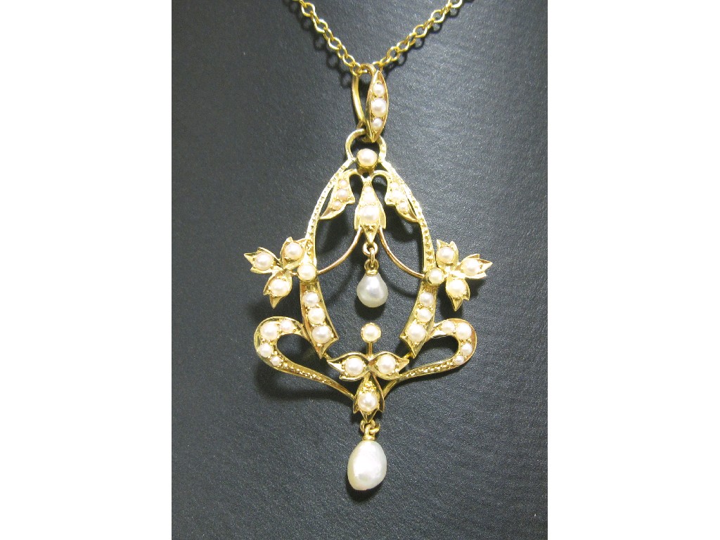 Appraisal: Edwardian gold seed pearl set Holbein pendant on gold neckchain