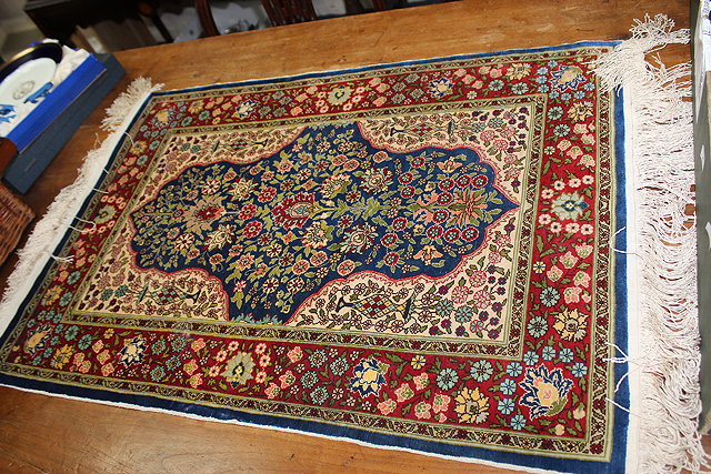 Appraisal: A SMALL ORIENTAL SILK MAT decorated with floral ground with