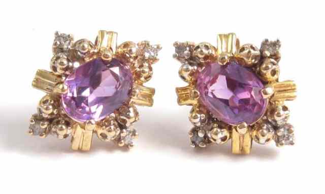 Appraisal: PAIR OF GARNET AND DIAMOND EARRINGS each k yellow gold