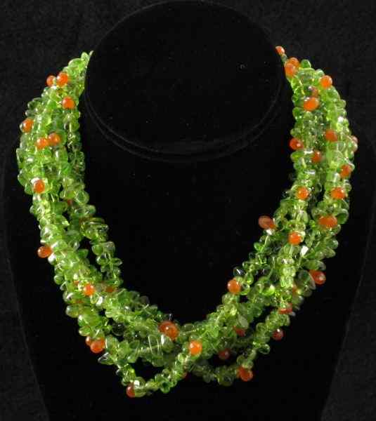 Appraisal: Peridot and Carnelian Necklacedesigned with five strands of tumbled peridot