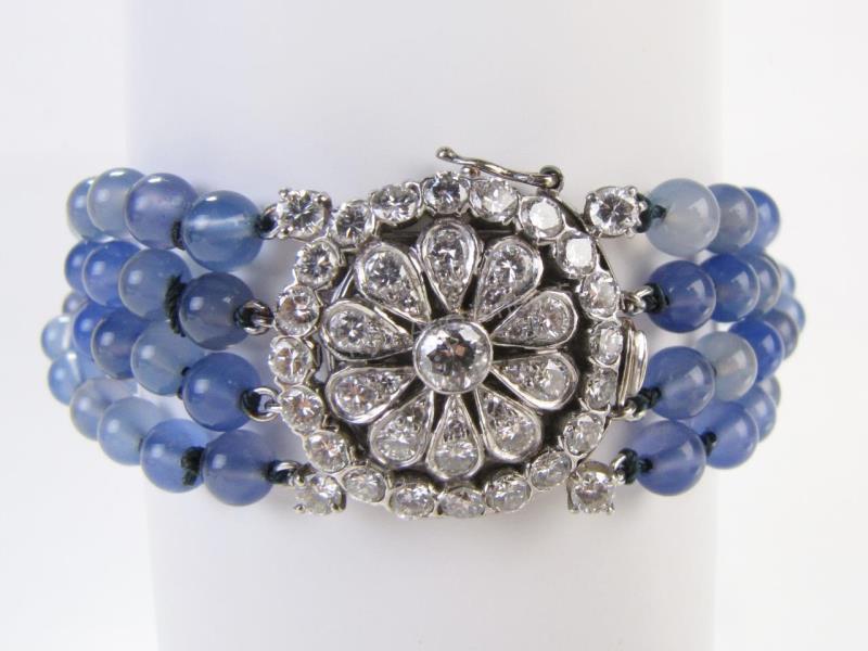 Appraisal: A K white gold bracelet with four strands of blue-purple