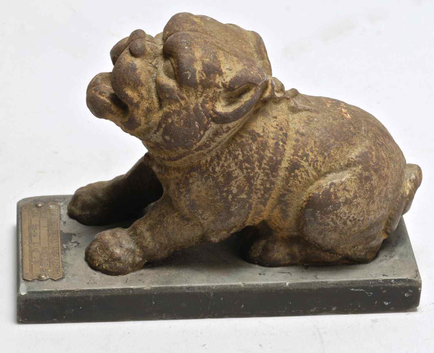 Appraisal: CAST IRON BULLDOG SCULPTUREIn howling form Mounted on black marble