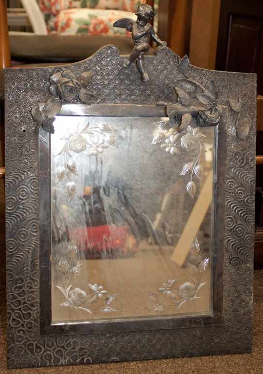 Appraisal: Victorian white metal etched glass mirror with applied putti and