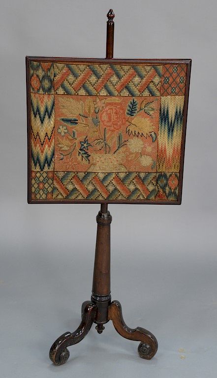 Appraisal: Pole screen with wool work and needlepoint panel height in