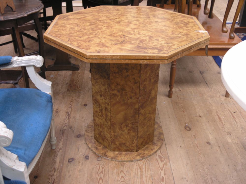 Appraisal: A burr walnut effect octagonal centre table on octagonal burr