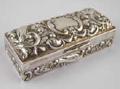 Appraisal: An embossed silver ring box by William Comyns London x