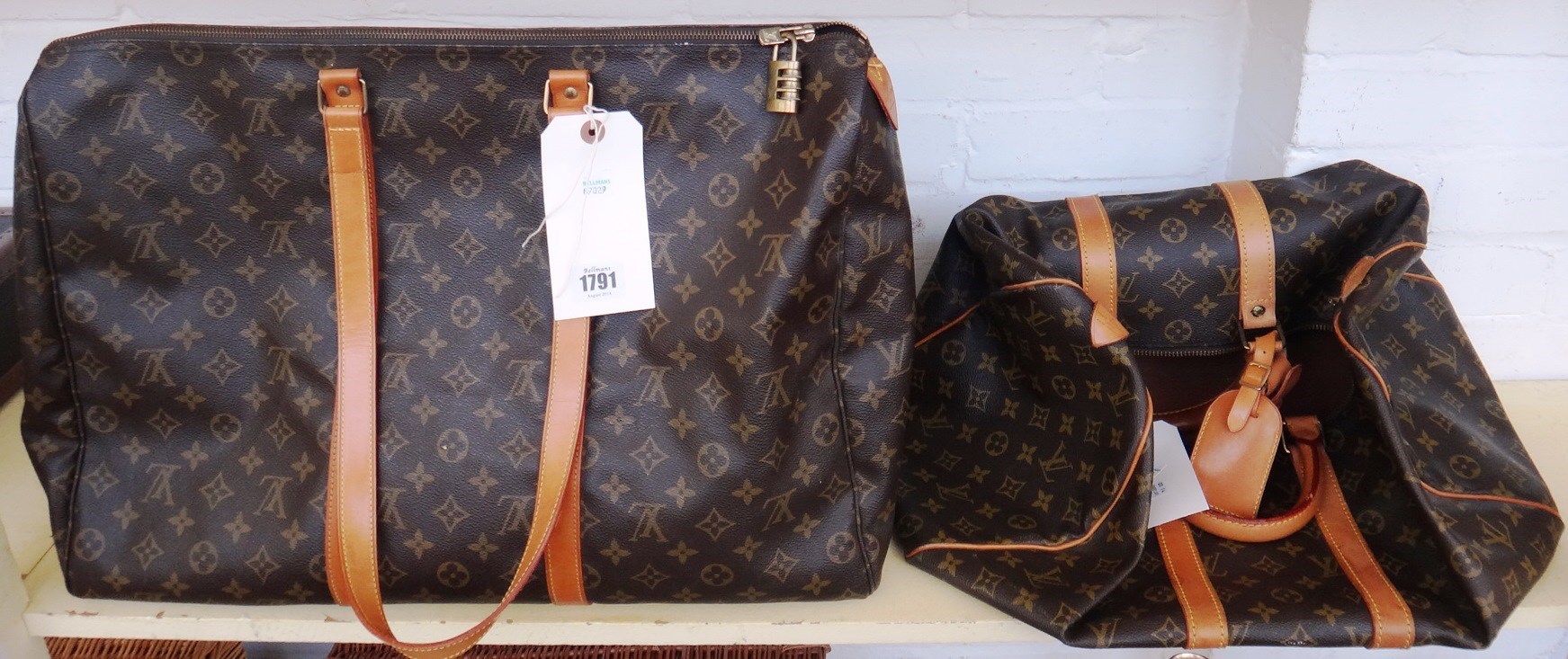 Appraisal: Two Louis Vuitton travel bags late th century each with