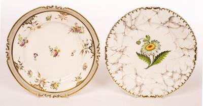 Appraisal: Two Rockingham plates one with central flower specimen to an