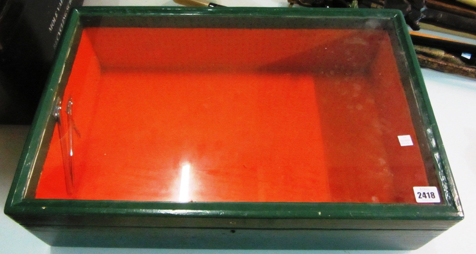 Appraisal: A green painted lift top display box