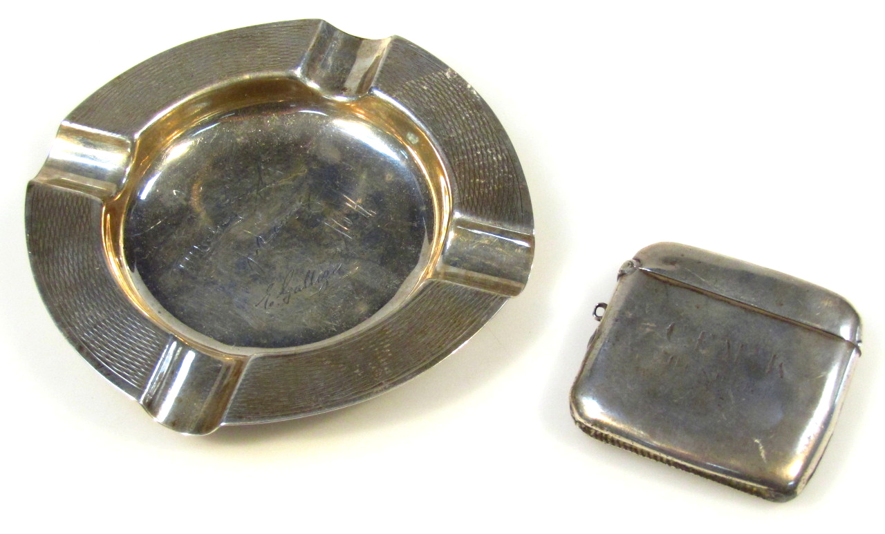 Appraisal: An Edwardian silver vesta case of enlarged square rounded outline