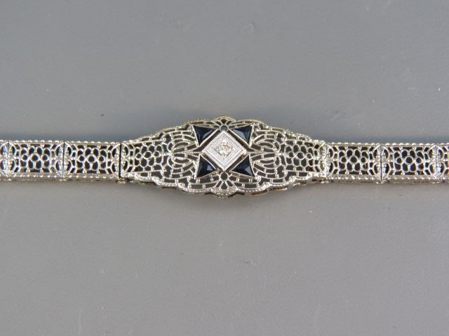 Appraisal: Diamond and Filigree Bracelet k white gold small diamond surrounded