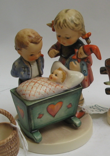 Appraisal: FOUR GERMAN HUMMEL FIGURINES Blessed Event HUM TM- Heavenly Angel