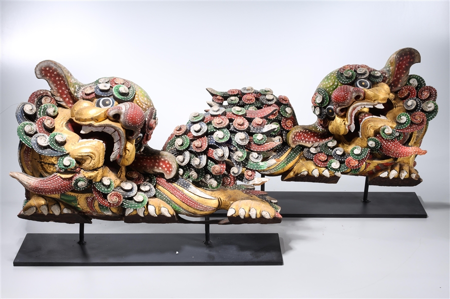 Appraisal: Pair of Chinese gilt and painted wood dragons on steel