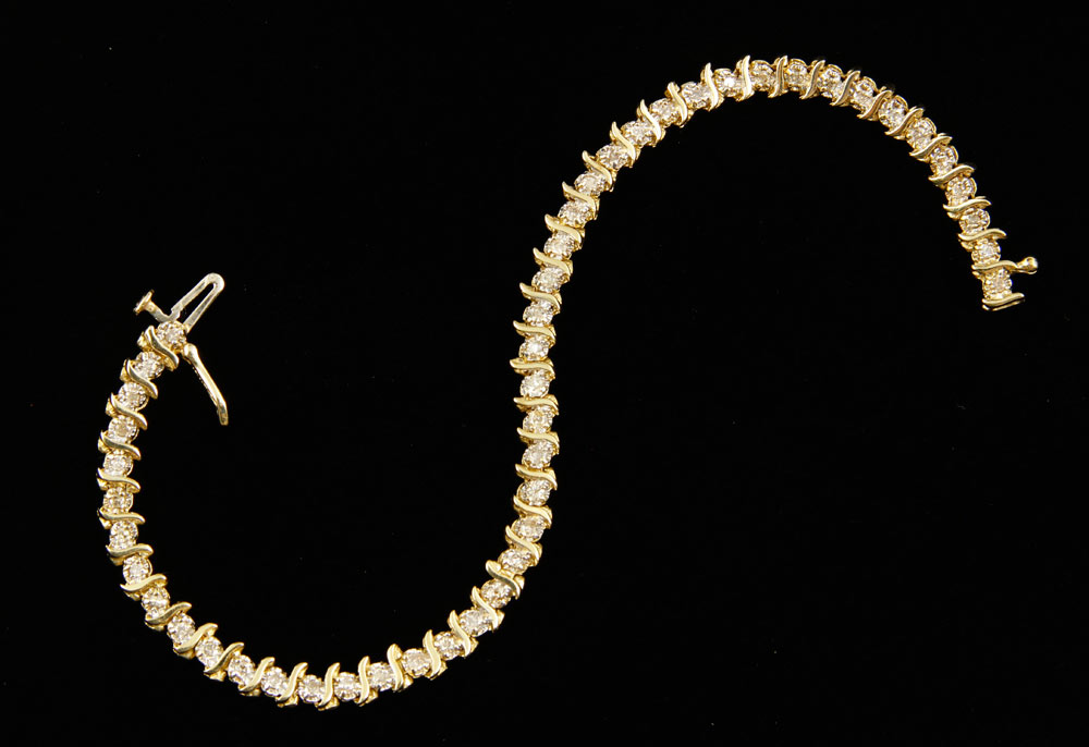 Appraisal: - K Diamond Bracelet K gold and diamond bracelet l