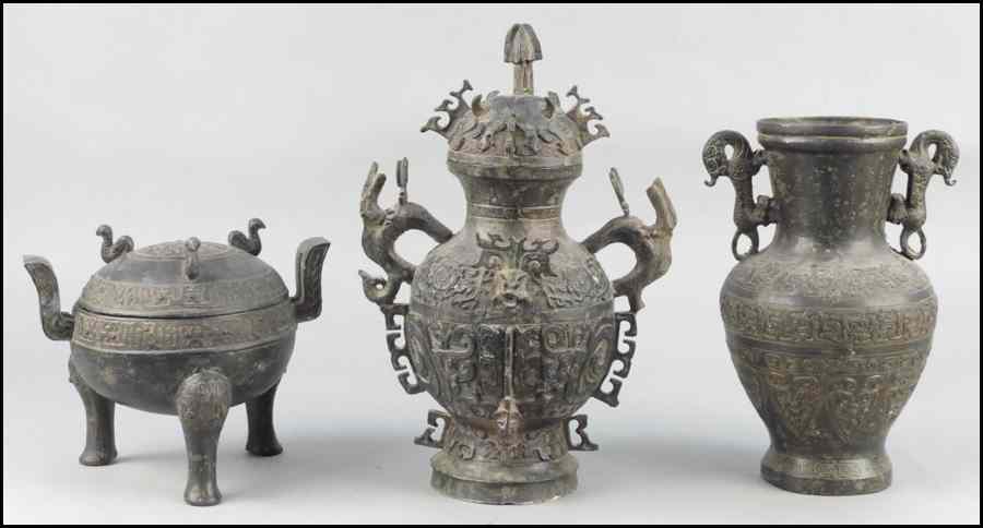 Appraisal: TWO CHINESE BRONZE COVERED VESSELS Together with a Chinese bronze