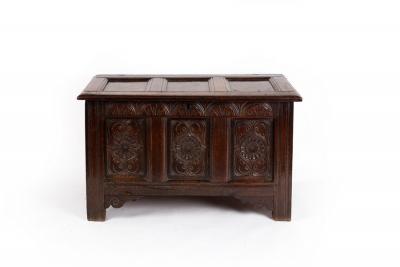 Appraisal: A th Century oak coffer the triple-panel lid over a