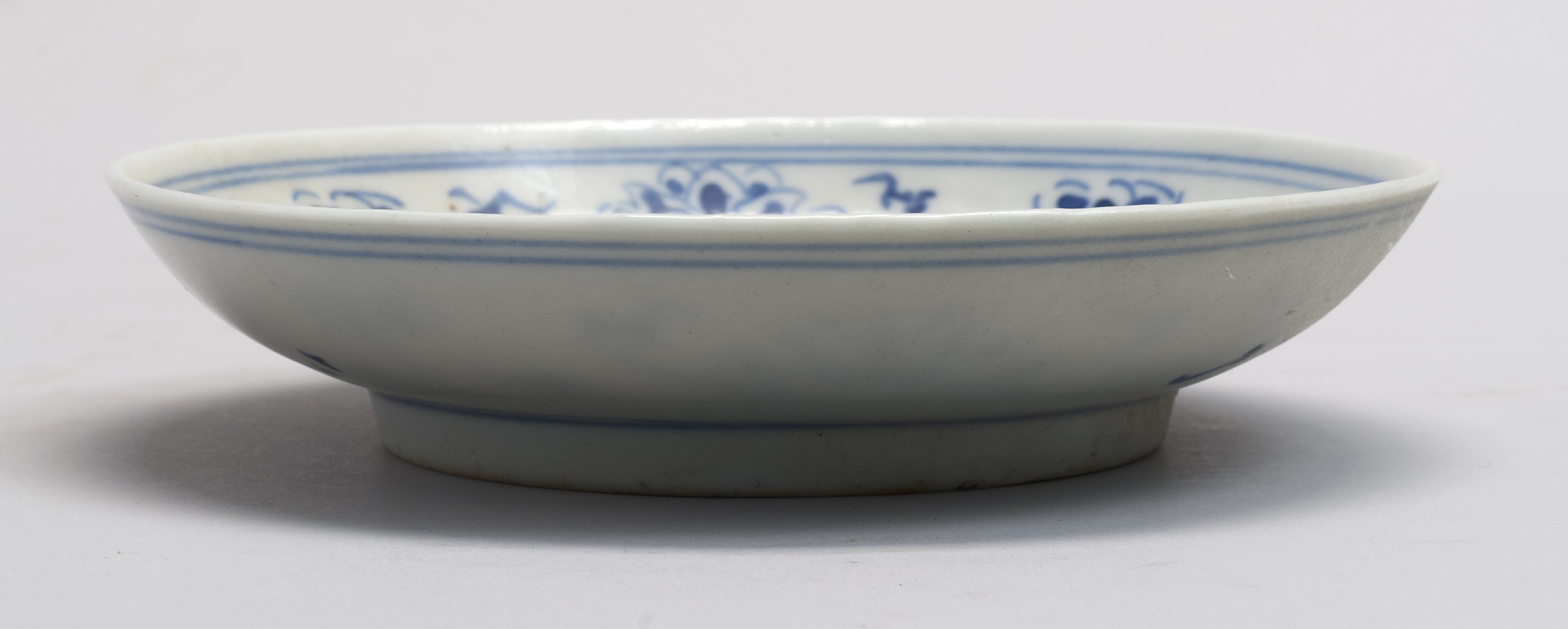 Appraisal: BLUE AND WHITE PORCELAIN DISH Asian th CenturyWith lotus flower