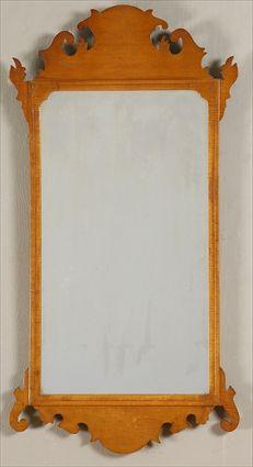 Appraisal: CHIPPENDALE FIGURED MAPLE MIRROR The molded frame surmounted by shaped