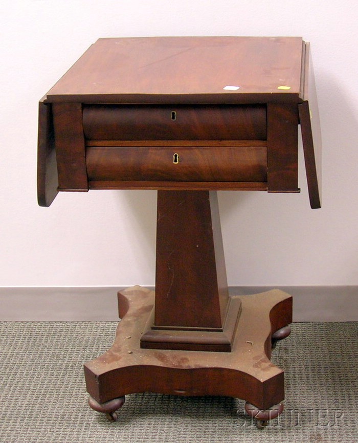 Appraisal: Empire Mahogany and Mahogany Veneer Drop-leaf Two-Drawer Pedestal-base Work Table