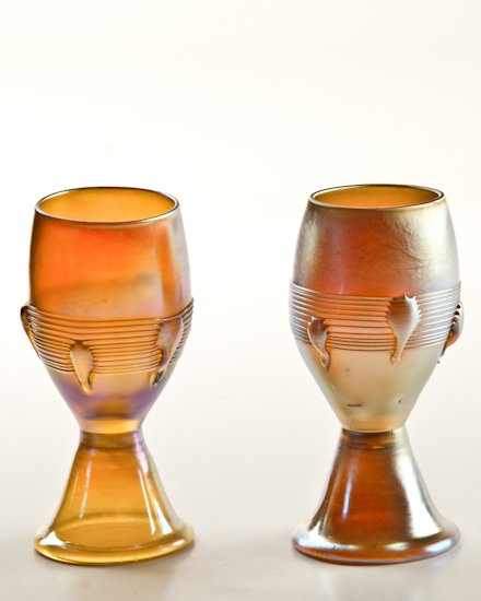 Appraisal: Two Tiffany Favrile Footed Cordials in iridescent gold with threaded