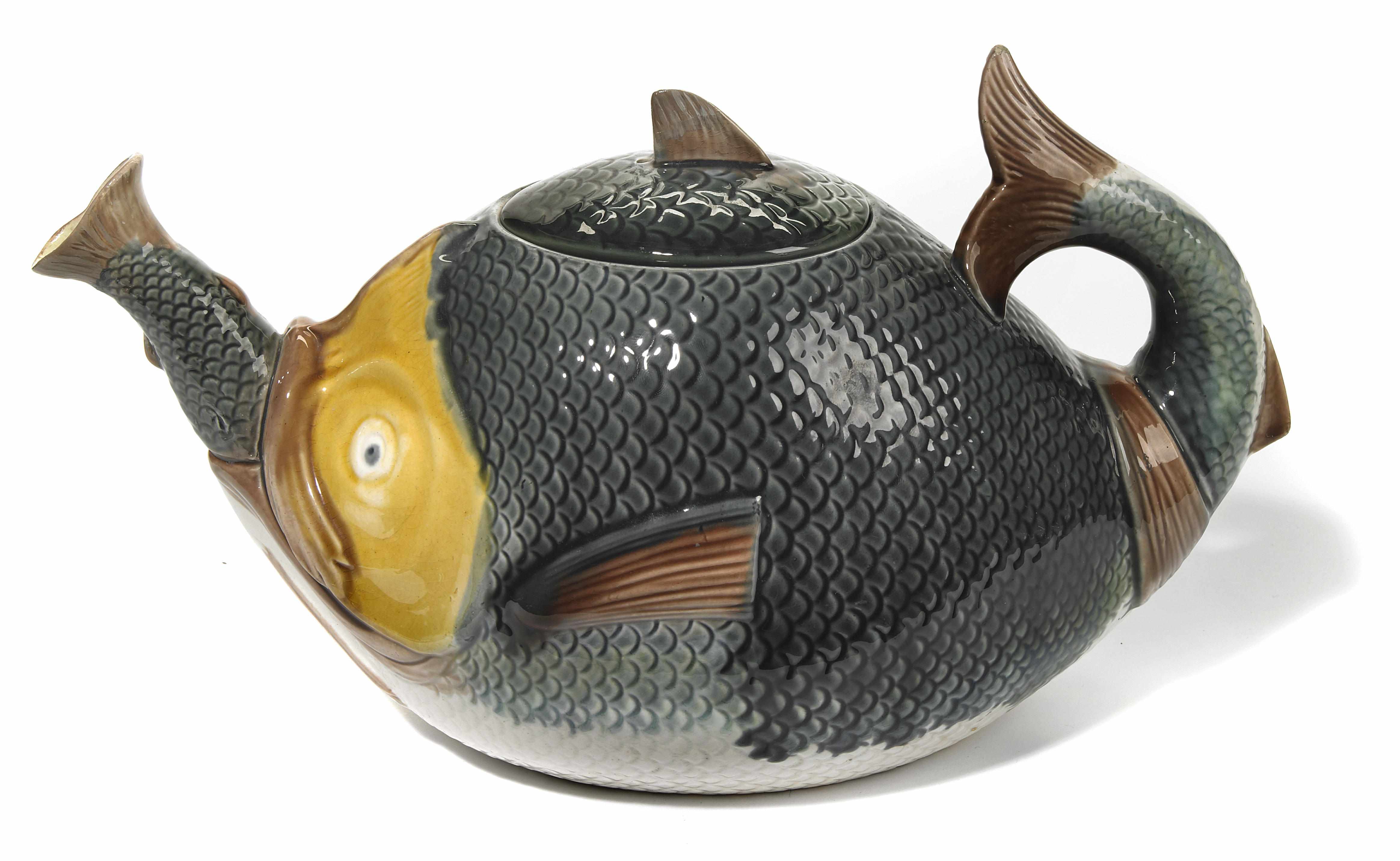 Appraisal: A Victorian majolica 'swallowing fish' teapot fourth quarter th century