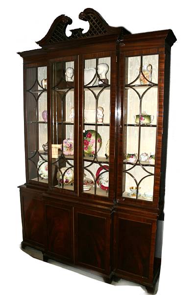 Appraisal: A George III style mahogany breakfront bookcase height ft in